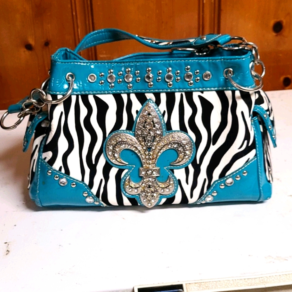 Teal zebra fleur-de-lis purse